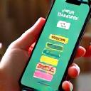 A smartphone screen showing a VitaGrove app interface with various brain training game icons.