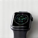 A close-up of a sleek, modern smartwatch displaying health metrics like heart rate and sleep data.